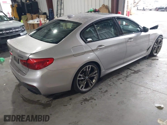 2020 BMW 5 Series M550i xDrive z VIN WBAJS7C07LCD85532, wystawiony jako IAAI lot #41518071 z przebiegiem 57 645 mil mil oraz . Historia ofert i sprzedaży dostępna na DreamBid. Obrazek 4.