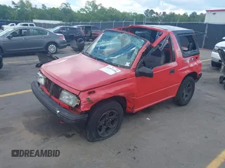 1995 Chevrolet Tracker z VIN 2CNBJ1869S6902771, wystawiony jako IAAI lot #41997456 z przebiegiem 171 629 mil mil oraz . Historia ofert i sprzedaży dostępna na DreamBid. Obrazek 2.