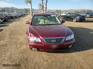 2009 Hyundai Azera GLS with VIN KMHFC46D29A349764, listed as a Copart auction lot 84111984 with 144,479 mi miles and Salvage Title. Bid and sale history available at carsss.com. Image 11.