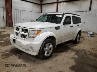 2010 Dodge Nitro SXT z VIN 1D4PT5GK8AW158064, wystawiony jako Copart lot #84274974 z przebiegiem 202 668 mil mil oraz Tytuł czysty. Historia ofert i sprzedaży dostępna na DreamBid. Obrazek 1.
