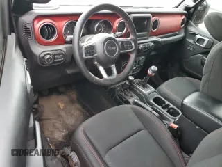 2021 Jeep Wrangler Rubicon z VIN 1C4HJXCG2MW665809, wystawiony jako Copart lot #84007354 z przebiegiem Nie podano mil oraz Szkoda całkowita • Salvage title. Historia ofert i sprzedaży dostępna na DreamBid. Obrazek 8.