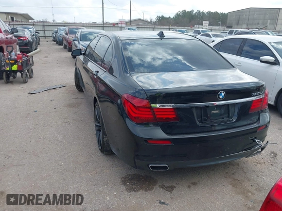 2013 BMW 7 Series 750Li with VIN WBAYE8C55DD133178, listed as a IAAI auction lot 41509860 with 90,841 mi miles and . Bid and sale history available at DreamBid. Image 3.