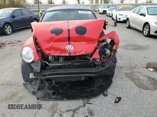 2013 Volkswagen Beetle with VIN 3VWHX7AT8DM604332, listed as a Copart auction lot 79781264 with 125,692 mi miles and Salvage Title. Bid and sale history available at DreamBid. Image 5.