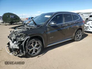 2017 BMW X1 xDrive28i z VIN WBXHT3C33H5F87803, wystawiony jako Copart lot #57713495 z przebiegiem 92 147 mil mil oraz Czysty tytuł • Clean title. Historia ofert i sprzedaży dostępna na DreamBid. Obrazek 1.