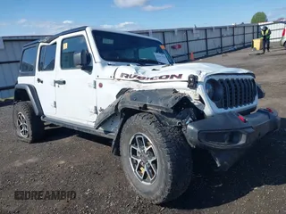 2024 Jeep Wrangler Rubicon with VIN 1C4PJXFG9RW307699, listed as a IAAI auction lot 42047562 with Not Provided miles. Bid and sale history available at carsss.com. Image 1.