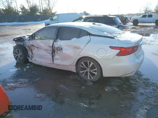 2018 Nissan Maxima S with VIN 1N4AA6APXJC395939, listed as a IAAI auction lot 41635836 with 108,587 mi miles and . Bid and sale history available at DreamBid. Image 14.