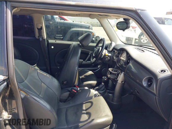 2006 MINI Hardtop S with VIN WMWRE33596TJ35502, listed as a IAAI auction lot 42474204 with 126,938 mi miles and . Bid and sale history available at DreamBid. Image 5.