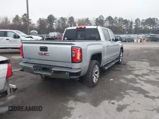 2017 GMC Sierra 1500 SLT z VIN 3GTU2NECXHG451794, wystawiony jako IAAI lot #40865850 z przebiegiem 243 866 mil mil oraz . Historia ofert i sprzedaży dostępna na DreamBid. Obrazek 4.