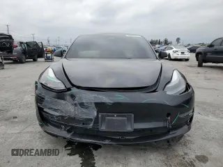 2022 Tesla Model 3 with VIN 5YJ3E1EA3NF190102, listed as a Copart auction lot 50657535 with 73,015 mi miles and Salvage Title. Bid and sale history available at DreamBid. Image 5.