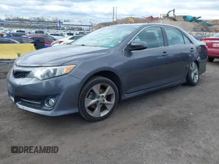 2014 Toyota Camry L with VIN 4T1BF1FK9EU818893, listed as a IAAI auction lot 42051996 with 125,924 mi miles. Bid and sale history available at carsss.com. Image 2.