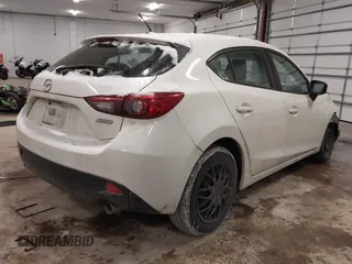 2015 Mazda 3 i Sport with VIN JM1BM1K79F1270618, listed as a IAAI auction lot 41394651 with 55,999 mi miles and . Bid and sale history available at DreamBid. Image 4.