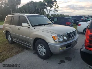 2000 Lexus LX 470 with VIN JT6HT00W8Y0120775, listed as a Copart auction lot 74629744 with 0 mi miles and Salvage Title. Bid and sale history available at carsss.com. Image 4.