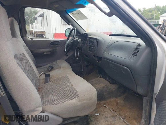 2003 Ford F-150 XL with VIN 1FTRF17203NA84217, listed as a IAAI auction lot 42324582 with 96,949 mi miles and . Bid and sale history available at DreamBid. Image 5.