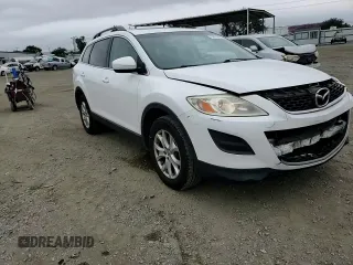 2012 Mazda CX-9 Touring with VIN JM3TB3CV3C0336043, listed as a Copart auction lot 59914335 with 106,595 mi miles and Salvage title. Bid and sale history available at DreamBid. Image 14.