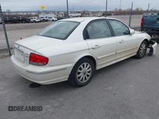 2002 Hyundai Sonata GLS with VIN KMHWF35HX2A523401, listed as a IAAI auction lot 41502680 with 176,283 mi miles. Bid and sale history available at carsss.com. Image 4.