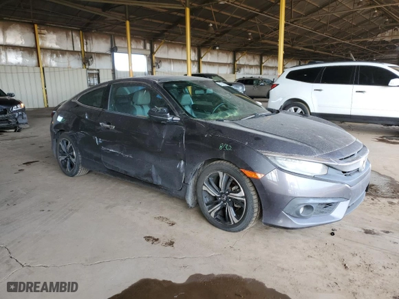 2016 Honda Civic Coupe Touring with VIN 2HGFC3B93GH351281, listed as a Copart auction lot 44242625 with 131,825 mi miles and Salvage Title. Bid and sale history available at carsss.com. Image 4.