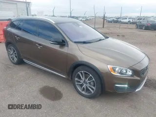 2016 Volvo V60 Cross Country T5 with VIN YV4612HKXG1012957, listed as a IAAI auction lot 41948492 with 73,354 mi miles. Bid and sale history available at carsss.com. Image 1.