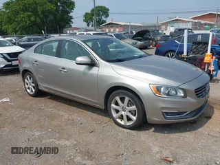 2016 Volvo S60 T5 Premier z VIN YV1612TK4G1394049, wystawiony jako IAAI lot #42491627 z przebiegiem 80 954 mil mil oraz . Historia ofert i sprzedaży dostępna na DreamBid. Obrazek 13.