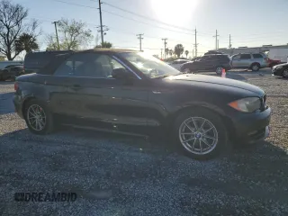2010 BMW 1 Series 128i with VIN WBAUL7C53AVJ77720, listed as a Copart auction lot 45293735 with 102,004 mi miles and Salvage title. Bid and sale history available at DreamBid. Image 4.