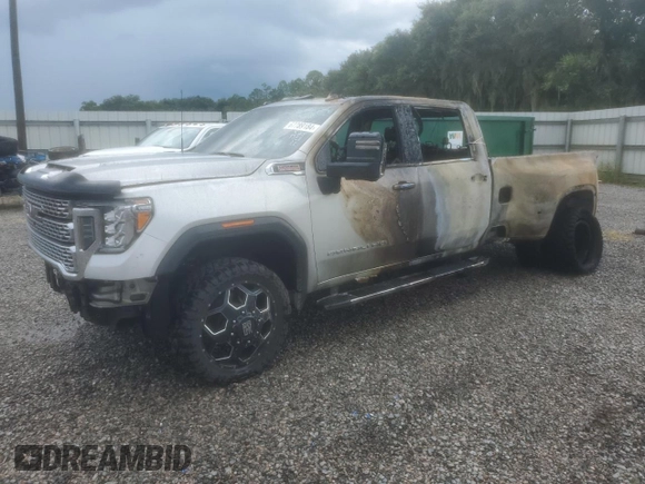 2023 GMC Sierra 3500HD Denali z VIN 1GT49WEY9PF202335, wystawiony jako Copart lot #67789184 z przebiegiem 24 537 mil mil oraz Nie do naprawy. Historia ofert i sprzedaży dostępna na DreamBid. Obrazek 1.