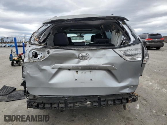 2016 Toyota Sienna SE with VIN 5TDXK3DC0GS725247, listed as a Copart auction lot 48266475 with 100,122 mi miles and Salvage title. Bid and sale history available at DreamBid. Image 6.