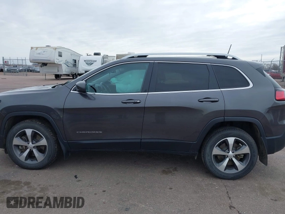 2020 Jeep Cherokee Limited with VIN 1C4PJMDX4LD589884, listed as a IAAI auction lot 41917930 with 57,703 mi miles and . Bid and sale history available at DreamBid. Image 14.