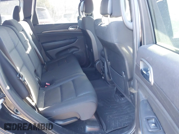 2018 Jeep Grand Cherokee Laredo E with VIN 1C4RJFAGXJC375588, listed as a IAAI auction lot 41406344 with 69,989 mi miles. Bid and sale history available at carsss.com. Image 8.