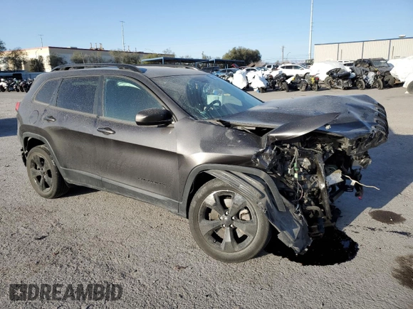 2016 Jeep Cherokee Altitude with VIN 1C4PJLCB6GW184782, listed as a Copart auction lot 46414594 with 63,121 mi miles and Salvage title. Bid and sale history available at DreamBid. Image 4.