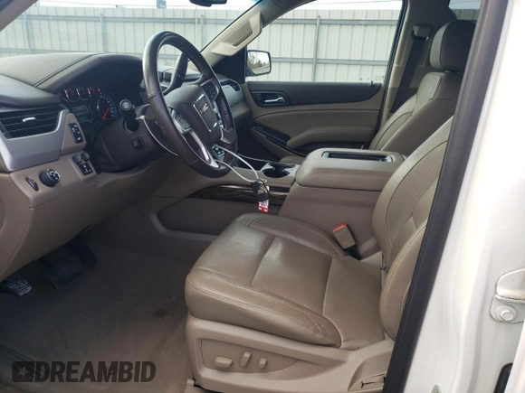 2019 GMC Yukon XL SLT with VIN 1GKS1GKC3KR189963, listed as a Copart auction lot 42402255 with 77,749 mi miles and Salvage Title. Bid and sale history available at carsss.com. Image 7.