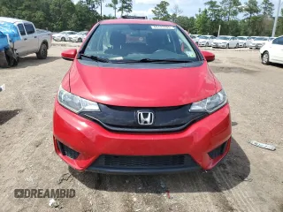 2016 Honda Fit LX with VIN JHMGK5H54GX010407, listed as a Copart auction lot 60127785 with 70,089 mi miles and Salvage title. Bid and sale history available at DreamBid. Image 5.