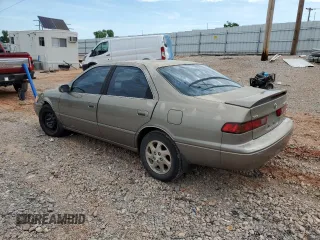 1999 Toyota Camry LE z VIN JT2BF28K9X0199531, wystawiony jako Copart lot #55637275 z przebiegiem Nie podano mil oraz Szkoda całkowita • Salvage title. Historia ofert i sprzedaży dostępna na DreamBid. Obrazek 2.