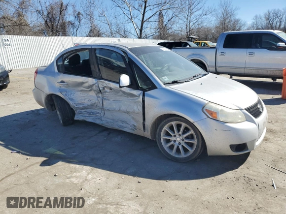2011 Suzuki SX4 LE with VIN JS2YC5A27B6301040, listed as a Copart auction lot 47218805 with 106,474 mi miles and Salvage Title. Bid and sale history available at carsss.com. Image 4.