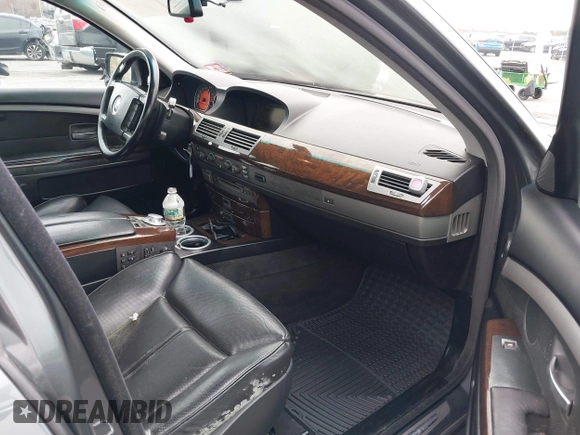 2005 BMW 7 Series 745Li with VIN WBAGN63595DS56807, listed as a IAAI auction lot 42018921 with 128,230 mi miles and . Bid and sale history available at carsss.com. Image 5.