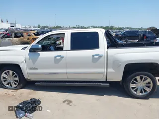 2014 Chevrolet Silverado 1500 High Country with VIN 3GCUKTEC4EG409072, listed as a IAAI auction lot 41986843 with 124,058 mi miles. Bid and sale history available at carsss.com. Image 15.