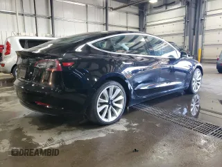2019 Tesla Model 3 Mid Range z VIN 5YJ3E1EA4KF310792, wystawiony jako Copart lot #53031595 z przebiegiem 99 799 mil mil oraz Szkody całkowita. Historia ofert i sprzedaży dostępna na DreamBid. Obrazek 3.