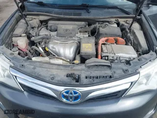 2012 Toyota Camry Hybrid XLE with VIN 4T1BD1FK9CU059021, listed as a IAAI auction lot 41932696 with 194,292 mi miles. Bid and sale history available at carsss.com. Image 10.