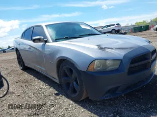 2013 Dodge Charger RT with VIN 2C3CDXCT4DH604611, listed as a IAAI auction lot 42196201 with 211,873 mi miles and . Bid and sale history available at carsss.com. Image 1.