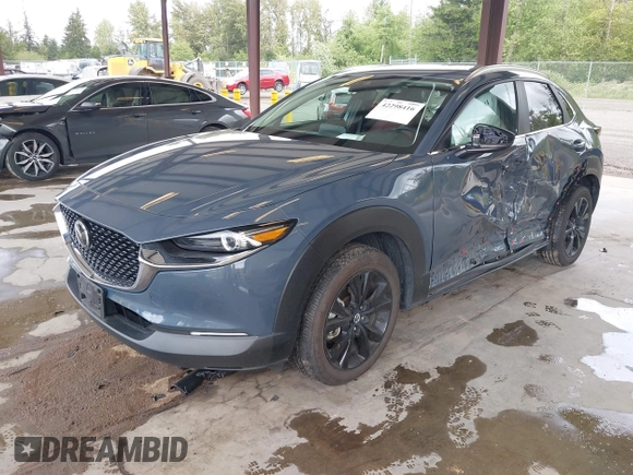 2023 Mazda CX-30 S Carbon Edition with VIN 3MVDMBCM1PM558865, listed as a IAAI auction lot 42298416 with 19,276 mi miles and . Bid and sale history available at DreamBid. Image 18.