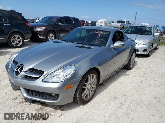 2009 Mercedes-Benz SLK-Class 3.0L with VIN WDBWK54F69F195983, listed as a Copart auction lot 75302124 with 0 mi miles and Salvage Title. Bid and sale history available at carsss.com. Image 1.