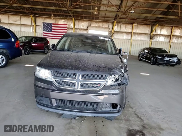 2014 Dodge Journey American Value with VIN 3C4PDCAB2ET301688, listed as a Copart auction lot 54731275 with 108,064 mi miles and Salvage Title. Bid and sale history available at DreamBid. Image 14.
