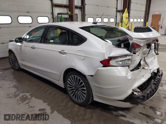 2018 Ford Fusion Titanium with VIN 3FA6P0RU1JR185937, listed as a IAAI auction lot 41863378 with 133,641 mi miles and . Bid and sale history available at DreamBid. Image 3.