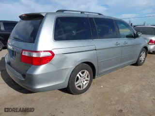 2007 Honda Odyssey EX-L with VIN 5FNRL38697B018839, listed as a IAAI auction lot 41981829 with 88,087 mi miles. Bid and sale history available at carsss.com. Image 4.