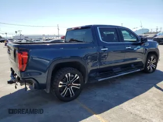 2022 GMC Sierra 1500 Denali with VIN 3GTU9FEDXNG213711, listed as a Copart auction lot 64112245 with 63,476 mi miles and Salvage title. Bid and sale history available at DreamBid. Image 3.