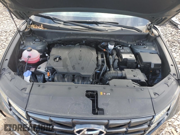 2023 Hyundai Tucson SEL z VIN 5NMJBCAE1PH272772, wystawiony jako Copart lot #56799805 z przebiegiem 20 041 mil mil oraz Szkoda całkowita • Salvage title. Historia ofert i sprzedaży dostępna na DreamBid. Obrazek 11.