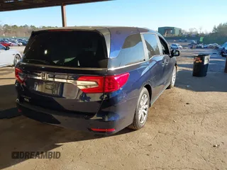 2019 Honda Odyssey LX with VIN 5FNRL6H2XKB124126, listed as a IAAI auction lot 40859906 with 24,369 mi miles and . Bid and sale history available at DreamBid. Image 4.