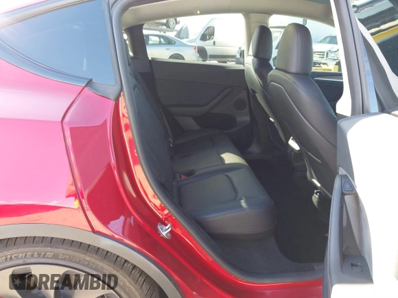 2024 Tesla Model Y Performance with VIN 7SAYGDEF3RF032980, listed as a IAAI auction lot 41619450 with 12,105 mi miles and . Bid and sale history available at DreamBid. Image 8.