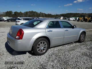 2005 Chrysler 300 with VIN 2C3JA43R55H664546, listed as a Copart auction lot 42572745 with 262,569 mi miles and Salvage Title. Bid and sale history available at carsss.com. Image 3.