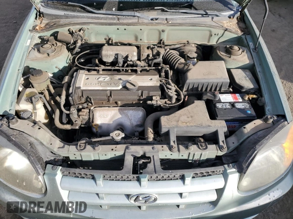 2003 Hyundai Accent GL with VIN KMHCG35CX3U242848, listed as a Copart auction lot 86558394 with 56,248 mi miles and Salvage Title. Bid and sale history available at carsss.com. Image 11.