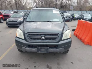 2004 Honda Pilot EX with VIN 2HKYF18644H516791, listed as a IAAI auction lot 41876348 with 291,358 mi miles. Bid and sale history available at carsss.com. Image 6.