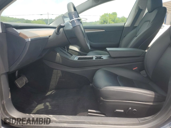 2023 Tesla Model 3 with VIN 5YJ3E1EA7PF576007, listed as a Copart auction lot 61674915 with 15,956 mi miles and Salvage title. Bid and sale history available at DreamBid. Image 7.
